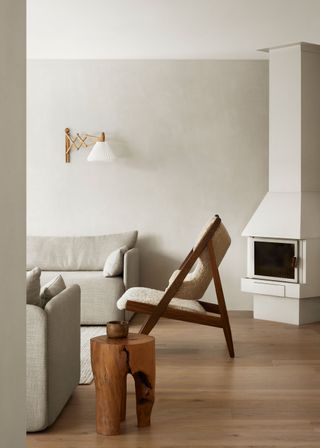 a scandi style living room with a log burner