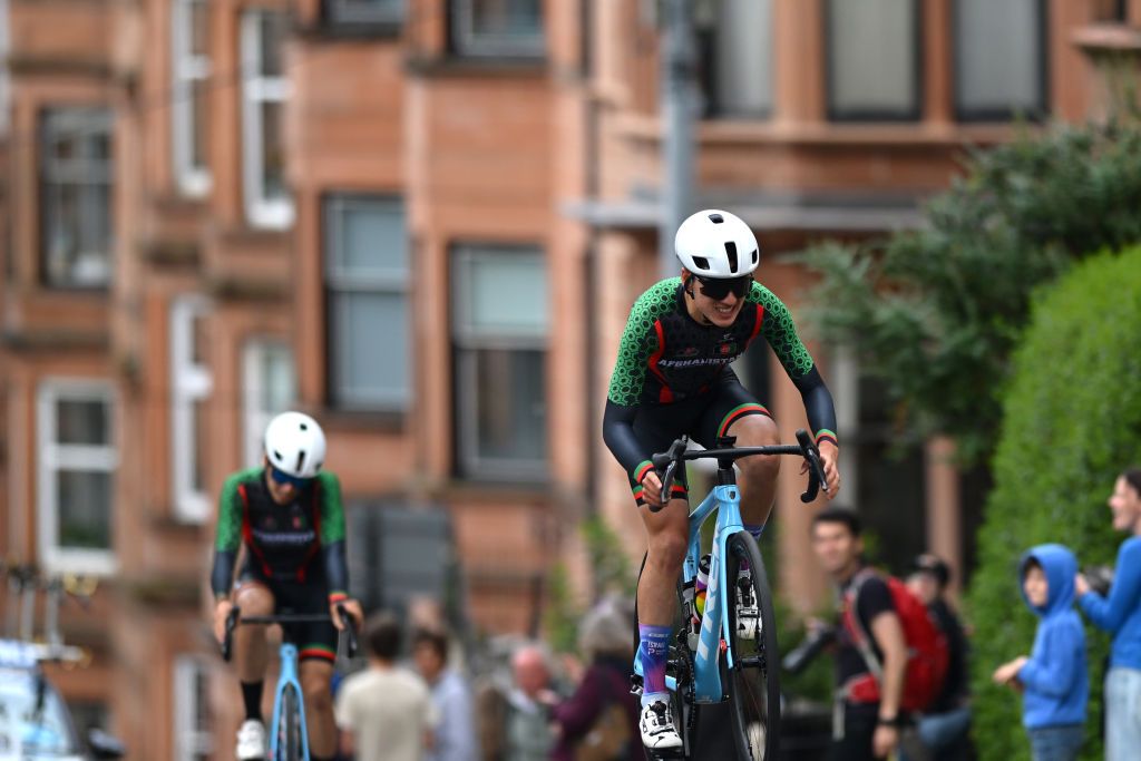 GLASGOW SCOTLAND AUGUST 08 Fariba Hashimi Yulduz Hashimi Zahra Rezayee and Team Afghanistan sprint during the Team Time Trial Mixed Relay a 403km race from Glasgow to Glasgow at the 96th UCI Cycling World Championships Glasgow 2023 Day 6 UCIWT on August 08 2023 in Glasgow Scotland Photo by Dario BelingheriGetty Images