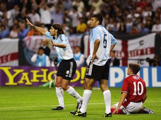 Mauricio Pochettino (left) of Argentina protests after bringing down Michael Owen of England for a penalty during the England v Argentina, Group F, World Cup Group Stage match played at the Sapporo Dome in Sapporo, Japan on June 7, 2002. England won the match 1-0.
