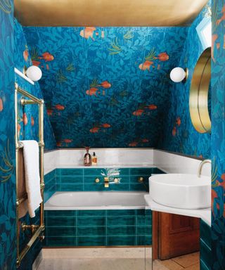 midcentury bathroom with blue patterned tiles and bath