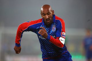 Nicolas Anelka in action for Shanghai Shenhua against Beijing Guoan in March 2012.