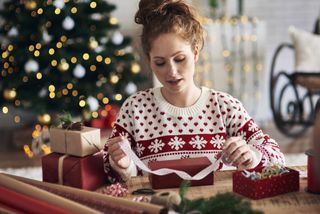 Woman wearing traditional Christmas jumper