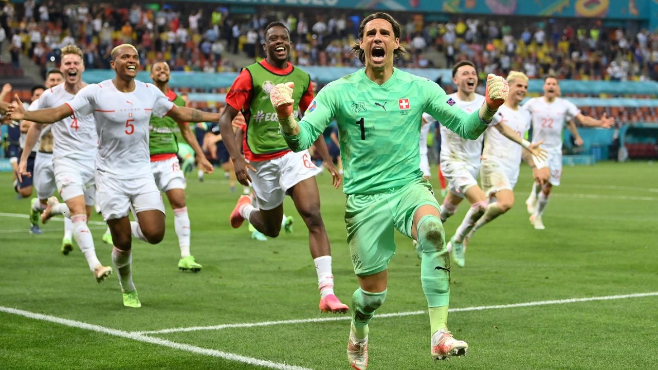 Switzerland keeper Yann Sommer celebrates his penalty save against France 