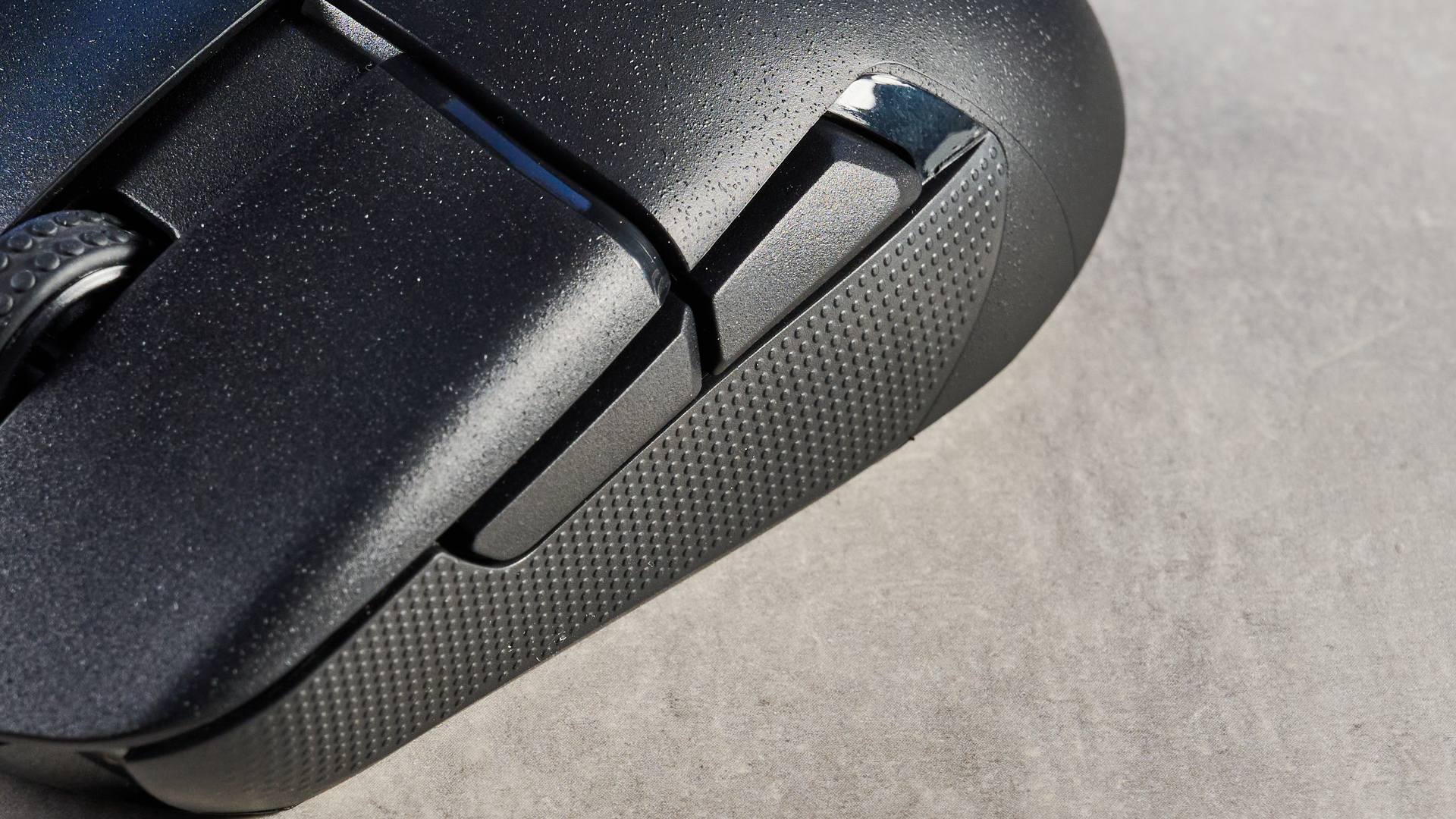 A black NZXT Lift Elite Wireless gaming mouse