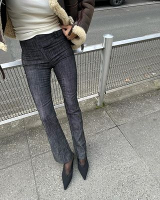 a woman in jeans and tights