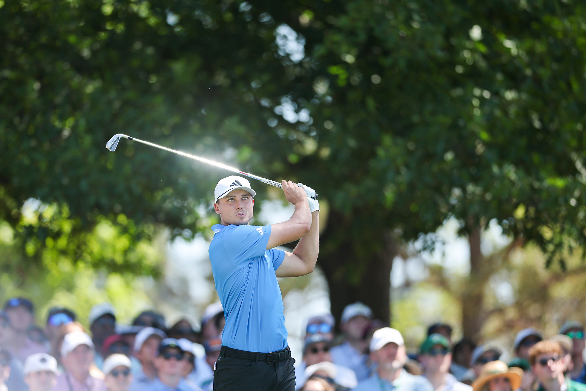 Ludvig Aberg hitting an iron shot at The Masters