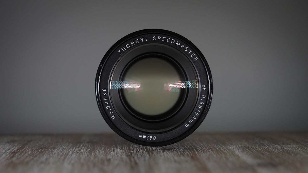 Zhongyi Mitakon Speedmaster 50mm f/0.95 on a wooden surface