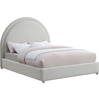 bed with arched headboard