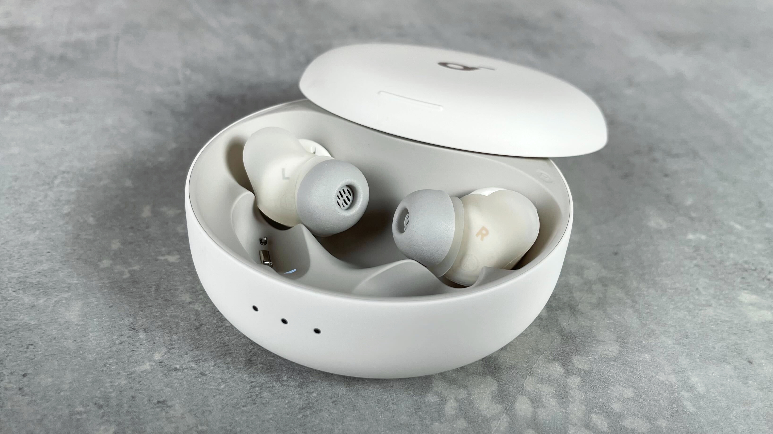 The Soundcore Sleep A30 case is pictured open, with the earbuds turned towards the camera.