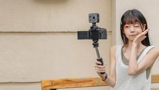 SmallRig SR-RG2 camera grip being used as a selfie stick