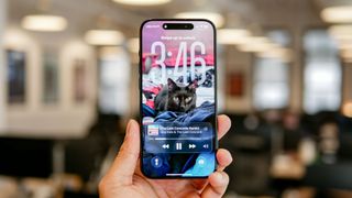 iOS 26 developer beta running on iPhone showing Liquid Glass interface.