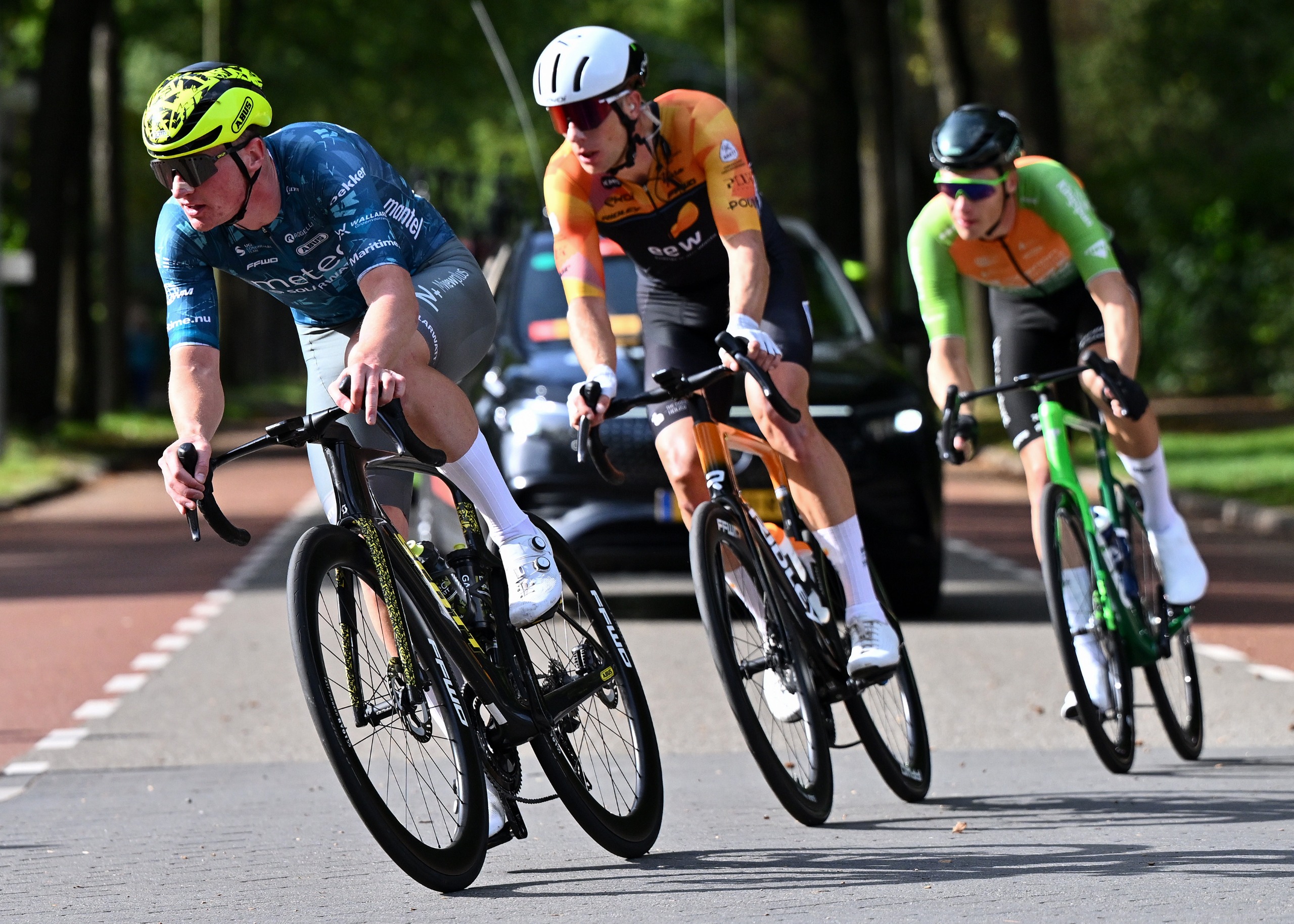 Johan Dorussen of Netherlands and Metec - SOLARWATT p/b Mantel, Rick Ottema of Netherlands and EEW-VDK Cyclingteam and Luke Verburg of Netherlands and Azerion / Villa Valkenburg compete in the breakaway during the 2nd Eneco Tour 2026, Stage 1 a 120km a stage from Ede to Ede on October 14, 2026 in Ede, Netherlands. (Photo by Luc Claessen/Getty Images)