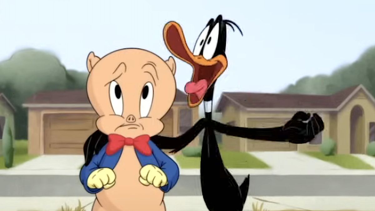 Daffy Duck puts his arm excitedly around a worried Porky Pig in The Day The Earth Blew Up: A Looney Tunes Movie.