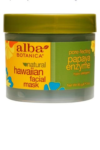 A jar of alba BOTANICA pore-fecting papaya enzyme mask set against a white background.