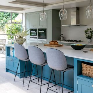 dining area with marble worktop and chairs