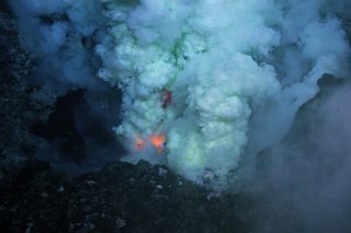 Explosive eruption at Prometheus vent on West Mata submarine volcano. The white smoke is sulfur.