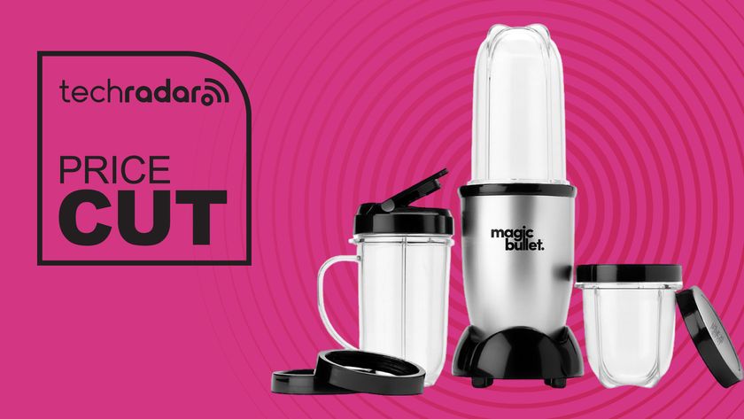 Magic Bullet blender 11-piece set on pink background with TechRadar price cut sign
