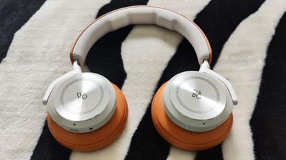 Bang & Olufsen Beoplay HX review: woman wearing premium over-ear headphones