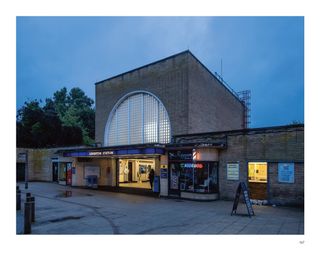 Tube station exterior at dusk, from new book London Tube Stations 1924-1961, FUEL Publishing