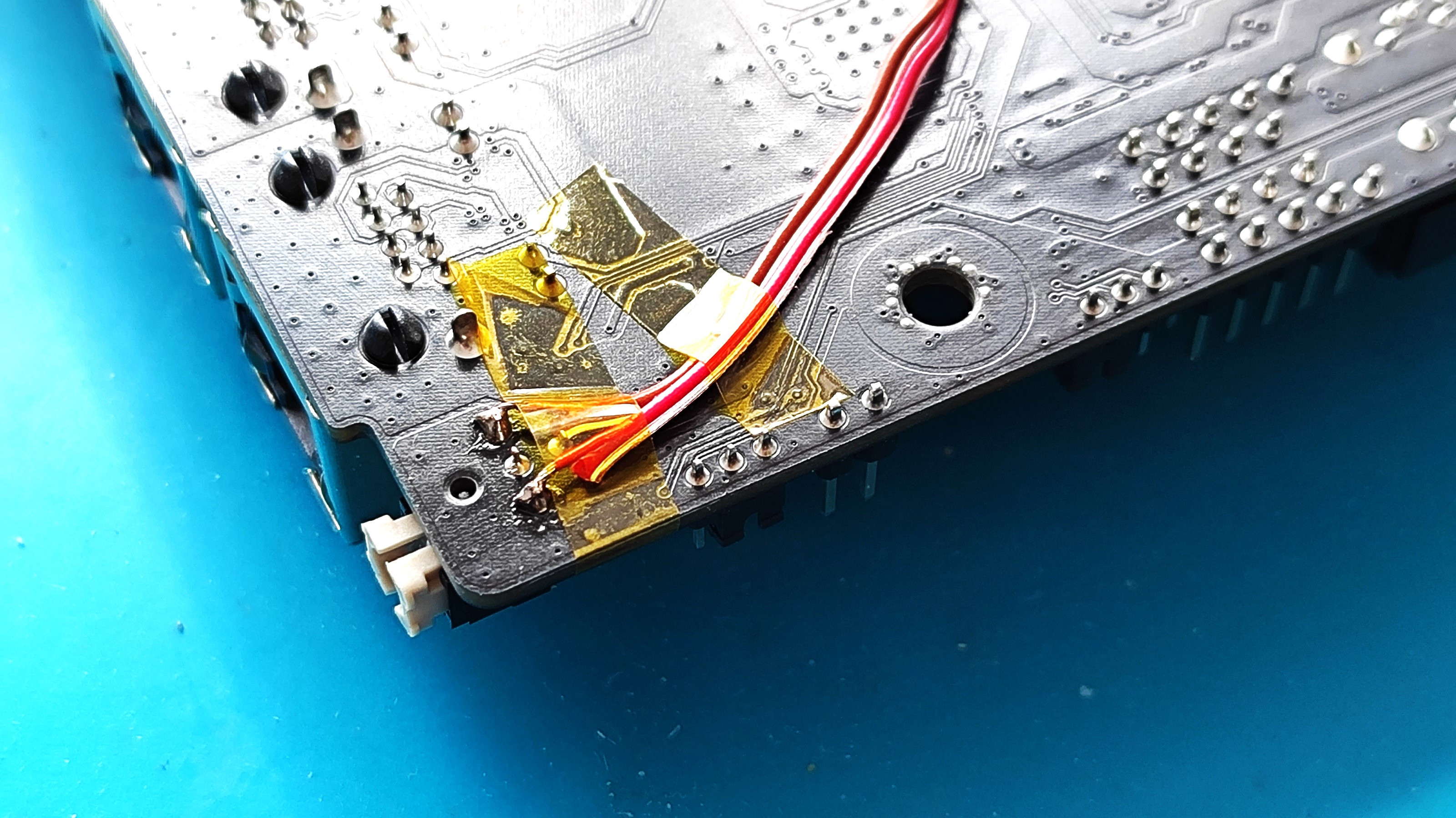 Kapton tape prevents the wires coming loose.