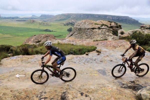 Marc Bass and Adrien Niyonshuti on the climb