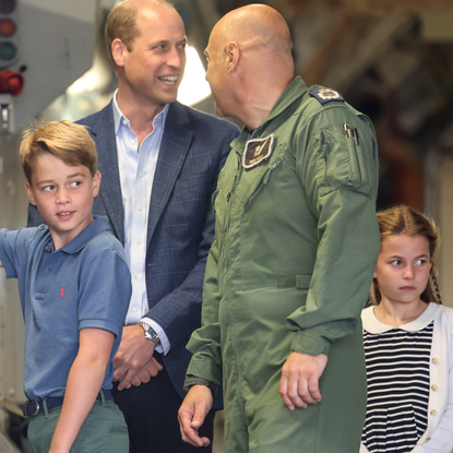 Prince William, Prince of Wales with Prince George of Wales and Princess Charlotte of Wales during their visit to the Air Tattoo at RAF Fairford on July 14, 2023 in Fairford, England. 