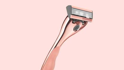 Friction Free Shaving razor on pink background