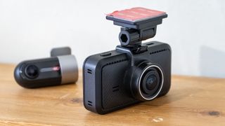 Miofive S1 Ultra dashcam on a wooden table