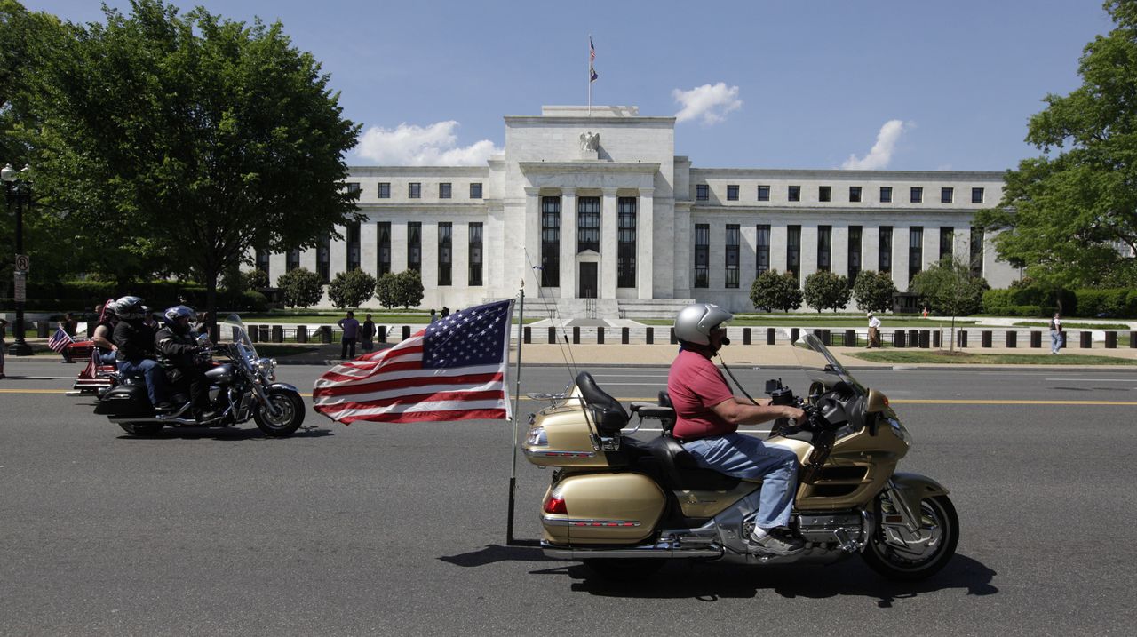 Motorcycclist participating in the The Rolling Thunder First Amendment Demonstration Run ride by the Federal Reserve Building in Washington, DC, on May 24, 2015. The Rolling Thunder First Ame