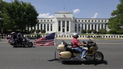 Motorcycclist participating in the The Rolling Thunder First Amendment Demonstration Run ride by the Federal Reserve Building in Washington, DC, on May 24, 2015. The Rolling Thunder First Ame