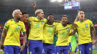Brazil players celebrate the 4-1 victory over South Korea in the last 16