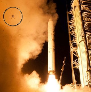 The launch of a rocket carrying NASA's newest moon probe sent a frog flying high. The frog can be seen in the top left corner (circled). Image uploaded Sept. 12, 2013