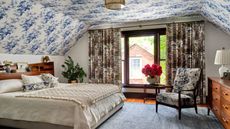 attic between with blue floral ceiling wallpaper