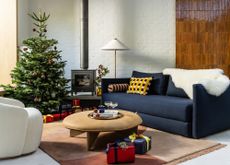 What are the six colors of Christmas: Living room with Christmas tree and presents by Heal's