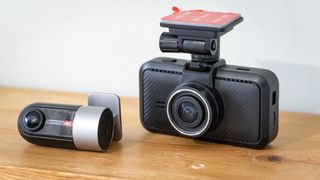 Miofive S1 Ultra dashcam on a wooden table