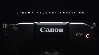 Dark, silhouetted image of a Canon Cinema EOS camera in shadow