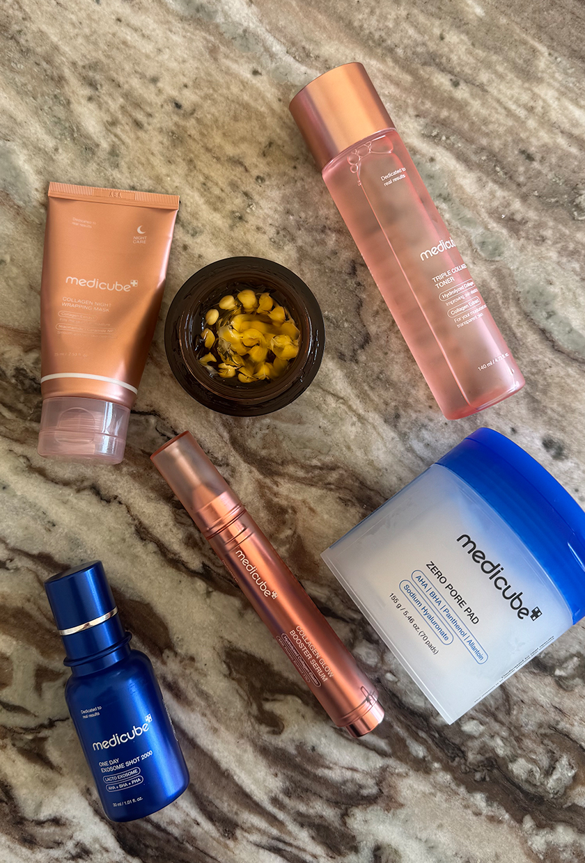 Medicube skincare products on marble tabkle