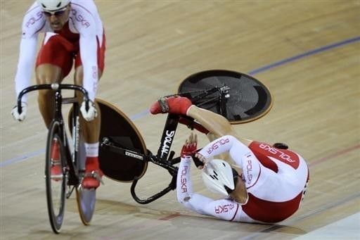 Hard knock: Kamil Kuczynski (Poland) falls during the men's team sprint