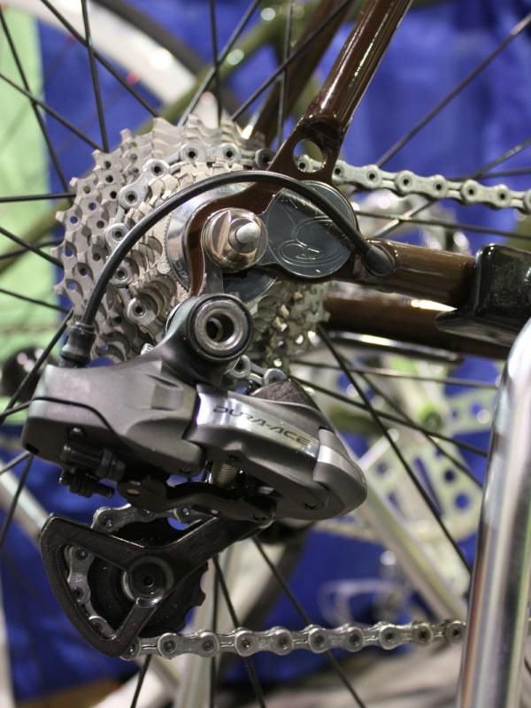 The rear derailleur wire exits neatly just ahead of the polished dropout.