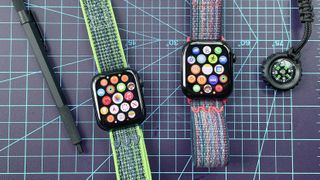 Close-up of an Apple Watch SE 2022 and Apple Watch Series 10; the former has a Nike Sport Loop dupe attached and the latter has the actual Nike Sport Loop strap