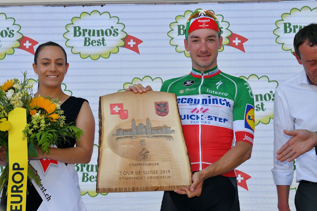 Elia viviani on the stage 5 podium at Tour de Suisse