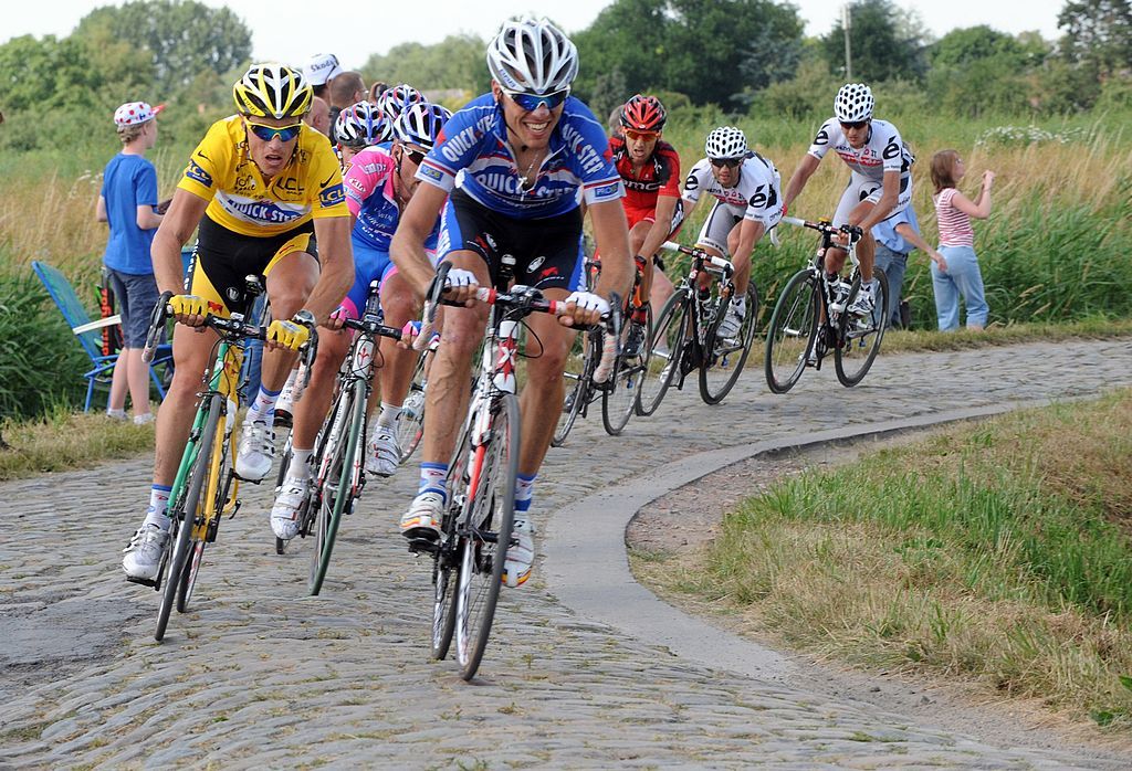 Frances Sylvain Chavanel L rides on July 6 2010 in the cobblestones area of TilloyLezMarchiennes during the 213 km and third stage of the 2010 Tour de France cycling race run between Wanze and Arenberg northern France AFP PHOTO FRANCOIS LO PRESTI Photo credit should read FRANCOIS LO PRESTIAFP via Getty Images