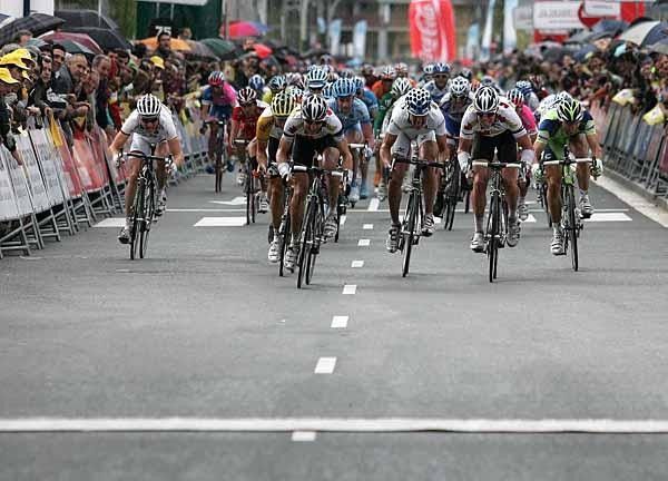 Possoni makes a last ditch effort to take the stage, but his team-mate Kirchen is coming on strong.