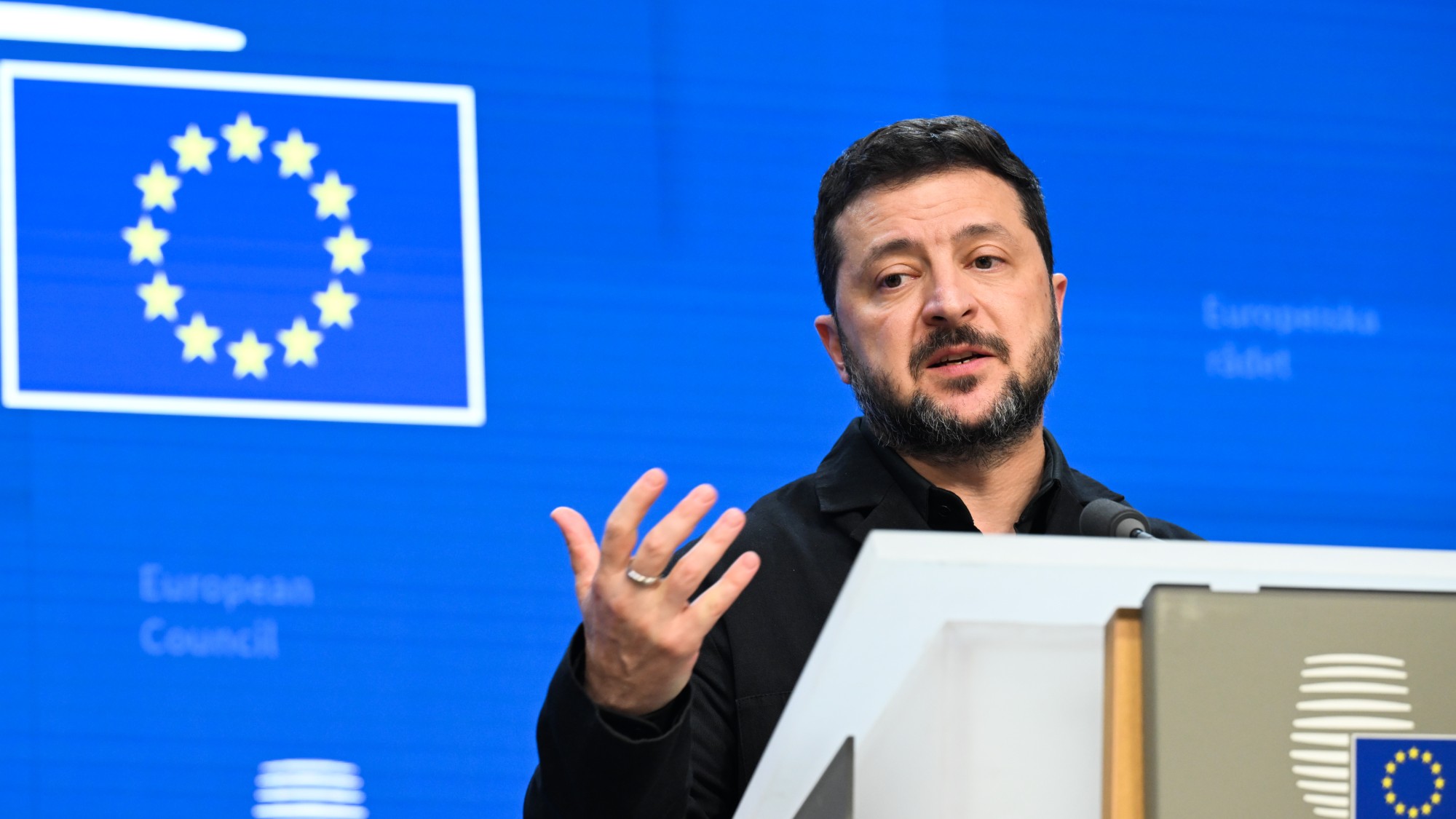Volodymyr Zelenskyy speaking at a news conference at a European Council meeting
