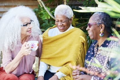 elderly ladies sat around laughing