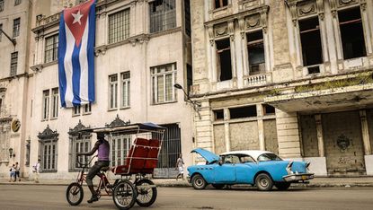 A Cuban flag is waved in Havana