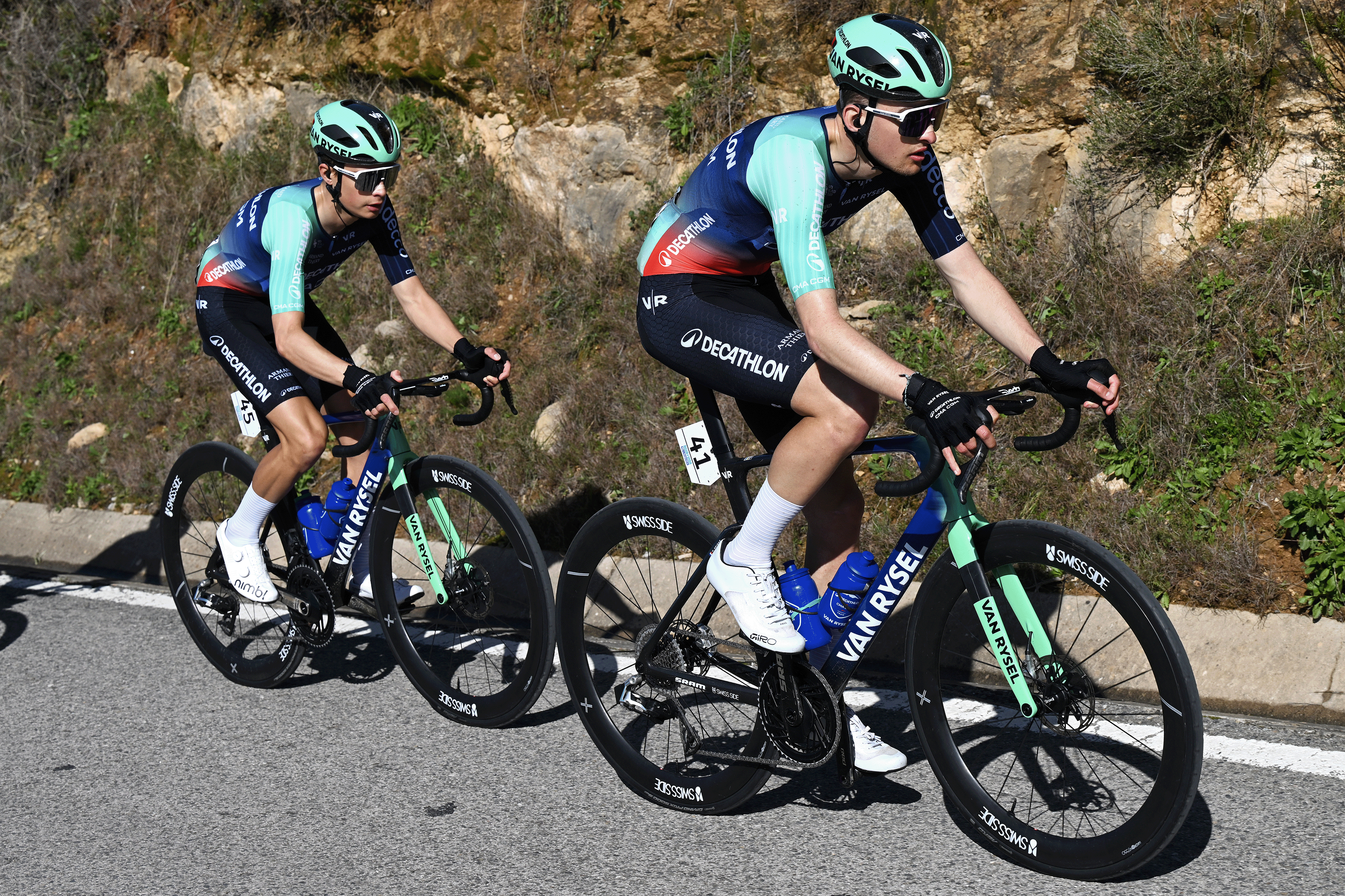 FOIA, PORTUGAL - FEBRUARY 19: (L-R) Matthew Riccitello of United States and Paul Seixas of France and Team Decathlon CMA CGM compete during the 52nd Volta ao Algarve em Bicicleta 2026, Stage 2 a 183.5km stage from Portimao to Foia (Monchique) 882m on February 19, 2026 in Foia, Portugal. (Photo by Dario Belingheri/Getty Images)