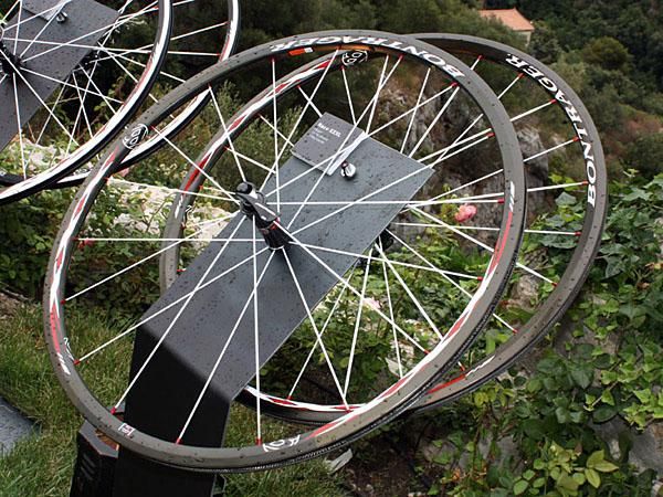 The Bontrager Race XXX Lite wheels lose two spokes up front and drop 30g per pair.