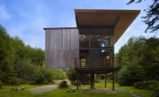 Open façade provide the occupants with unimpeded views of the surrounding wilderness