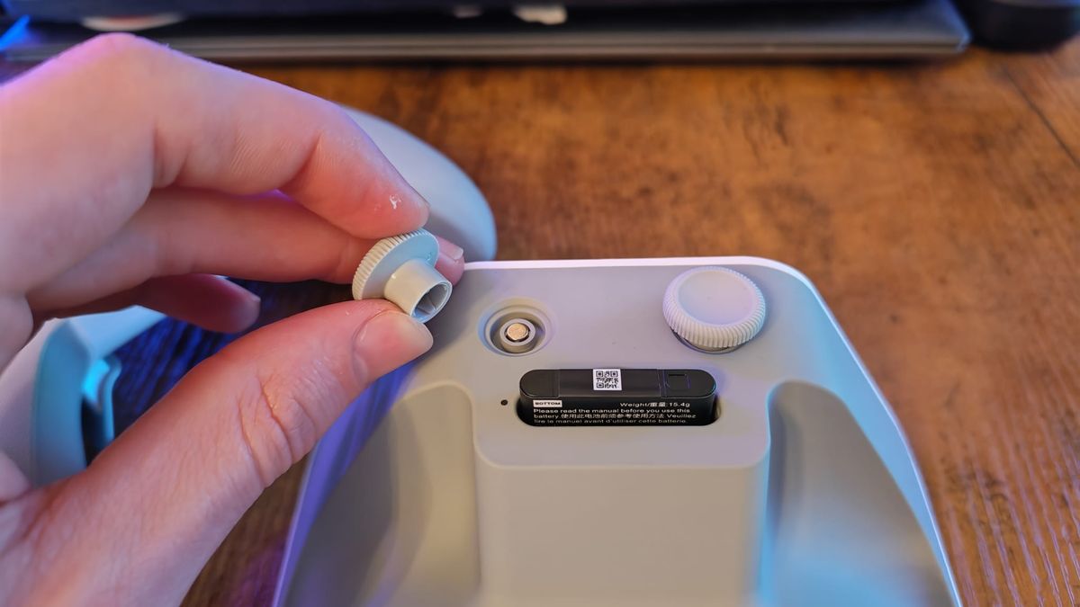 The magnetic thumbstick tops on the SteelSeries Aeon Pro's charging stand